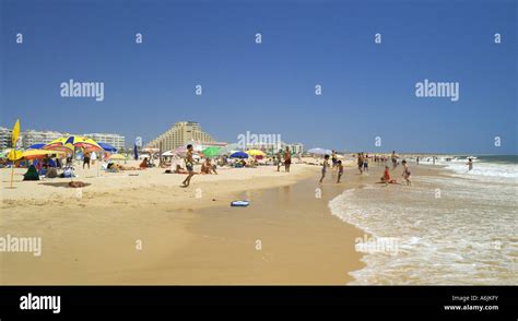 Portugal the Algarve, Monte Gordo beach in summer from the shore towards hotels Stock Photo - Alamy