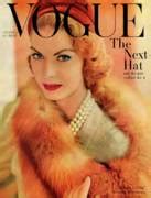 A Vogue Cover Of Mary Mclaughlin Wearing A Fox by Horst P. Horst