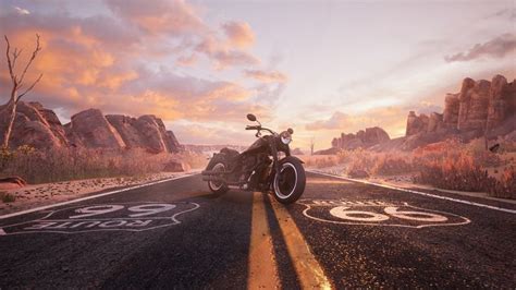 a motorcycle is parked on the side of an empty road in front of some ...