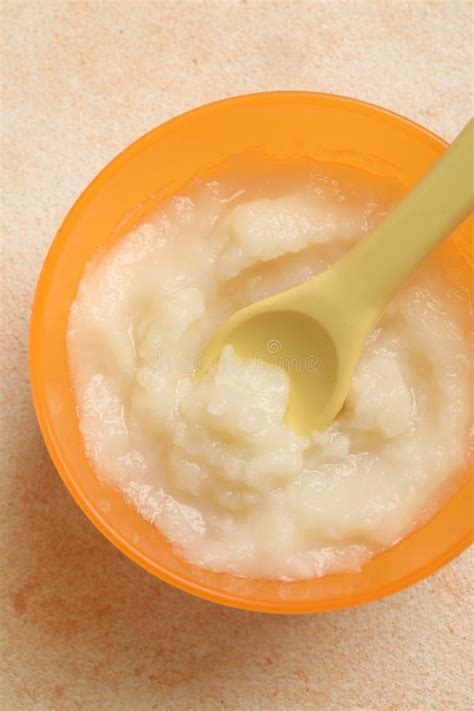 Baby Food. Bowl with Cauliflower Puree on Beige Textured Table, Top ...