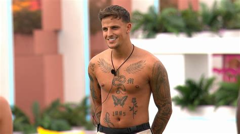 Here’s the meanings behind Love Island star Luca Bish’s tattoos | Goss.ie