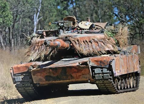 Australian M1A1 Abrams with natural camouflage applied while on ...