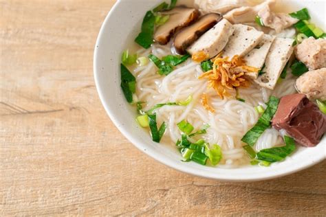 Premium Photo | Vietnamese rice noodles soup with vietnamese sausage ...