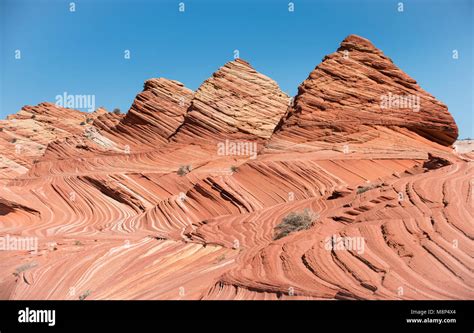 Pyramid shaped sandstone rock formations at Coyote Buttes North, part ...