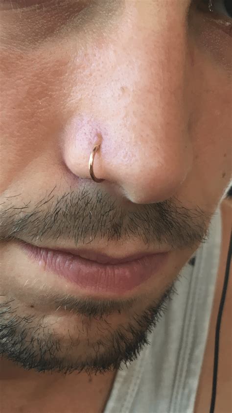 Nose piercing bump keeps getting bigger : r/piercing