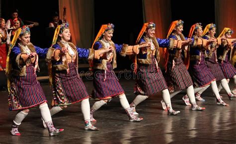 People in Traditional Folklore Costumes Perform Folk Dance Bulgarian ...