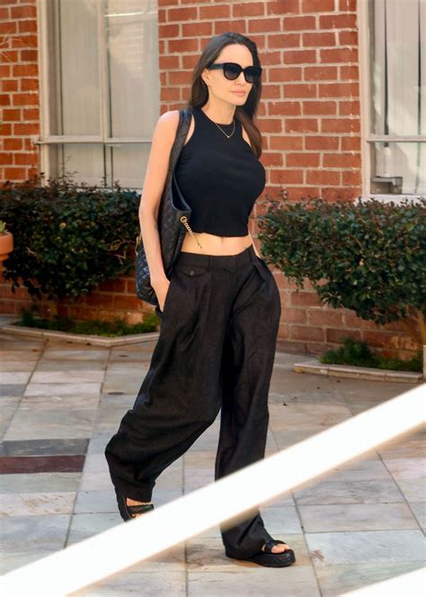 Angelina Jolie Goes Casual in Breezy Trousers and a Cropped Tank