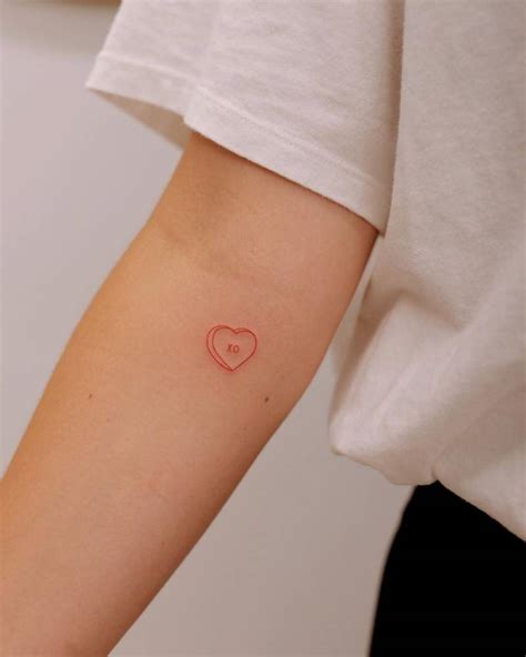 Sweetheart tattoo located on the inner forearm, fine