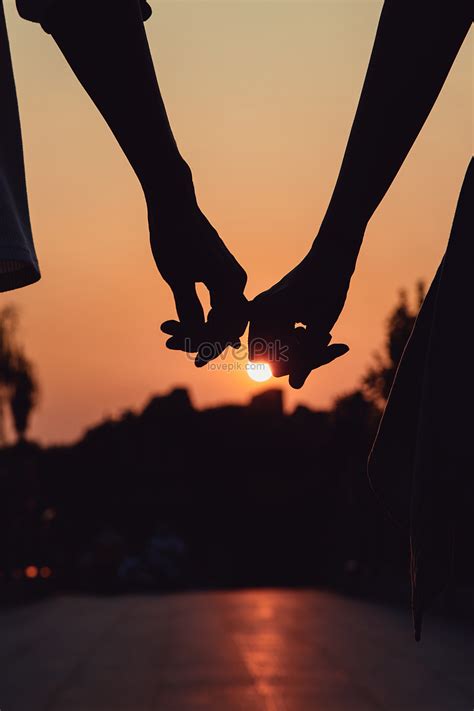 Couple In The Sunset Holding Hands Silhouette Picture And HD Photos ...