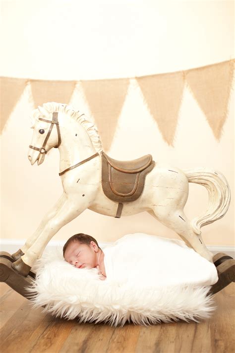 newborn boy with rocking horse Taken by Shoshannah May of Smiles and ...