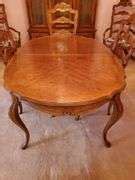 Drexel dining room set including 63" matched wood with scalloped edge table. (2) 20" leaves, six ...