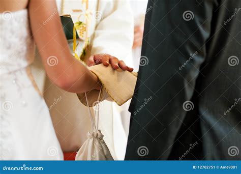 Wedding Couple Receiving Blessing from Priest Stock Image - Image of ...