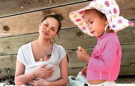 Chrissy Teigen + John Legend are helping Luna adjust to her baby brother in the best way - Motherly