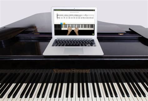 Learn how to play the piano with Skoove & your acoustic piano