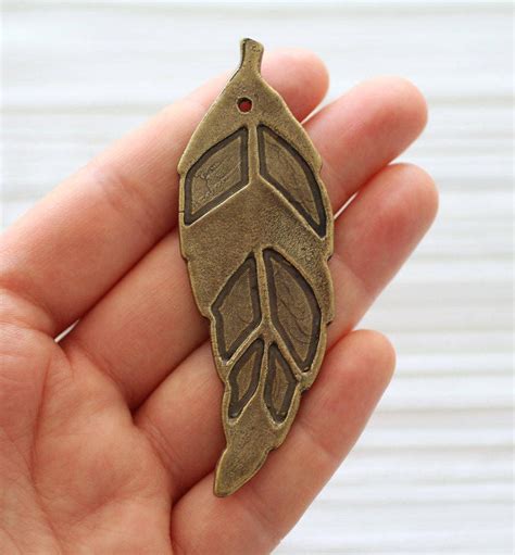 Large antique gold leaf pendant