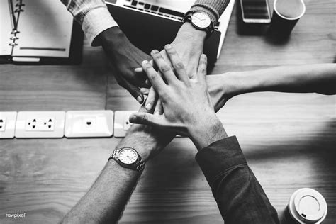 Team of business people stacking hands | Free for commercial… | Flickr