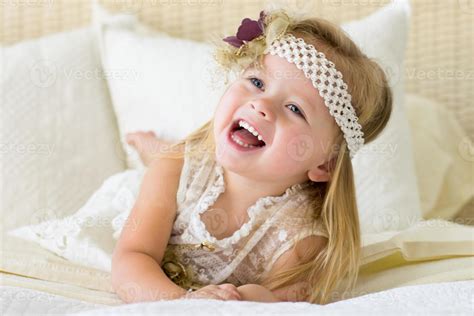 Little girl laughing 869579 Stock Photo at Vecteezy