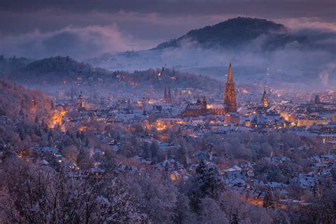 Freiburg in the snow looks like something out of a winter fairy tale (© @micha_foto) : r/germany