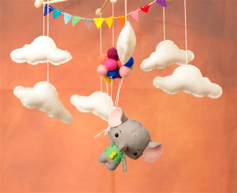 I finally finished my baby elephant themed baby mobile : r/BabyBumps