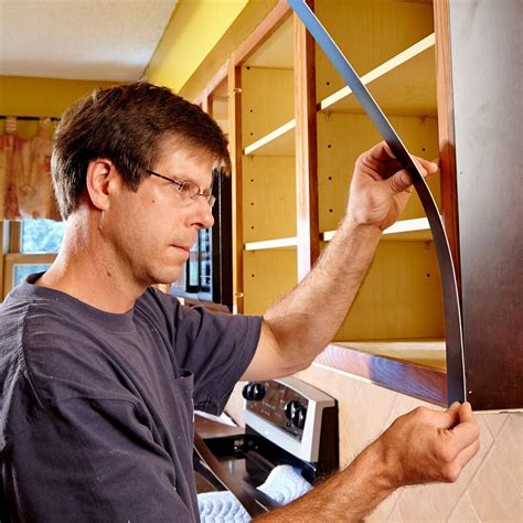 Tired of your kitchen cabinets? Instead of replacing them, consider cabinet refacing. It's DIY ...