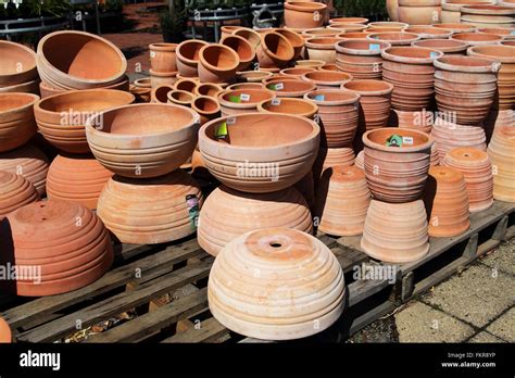 Terracotta pots for sale at garden nursery Stock Photo - Alamy