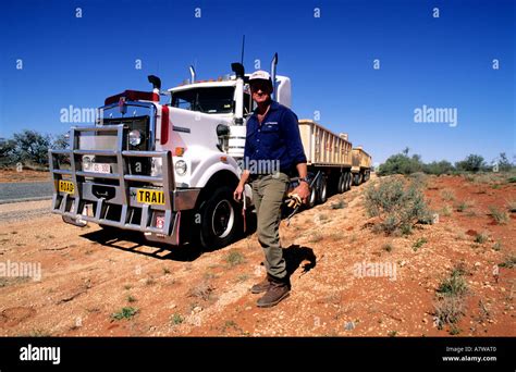 Australia, Northern Territory, truck driver before his road train Stock ...