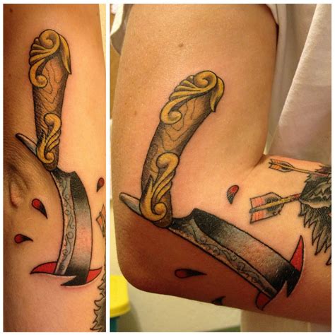 Dangerous Razor Blade traditional tattoo on Elbow in Motion - Best Tattoo Ideas Gallery