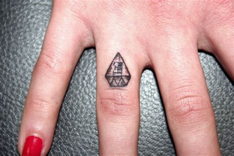 20 Beautiful Ring Finger Tattoo Designs - DesignCanyon