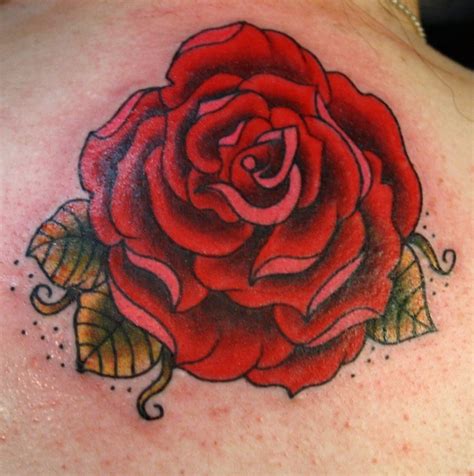 Traditional rose flower with green leaves tattoo - Tattooimages.biz