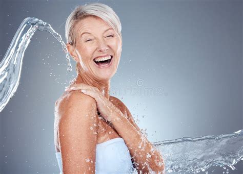 Mature Woman Splash Face Water Stock Photos - Free & Royalty-Free Stock Photos from Dreamstime