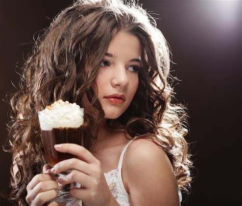 Premium Photo | Girl with glass of coffee witn cream