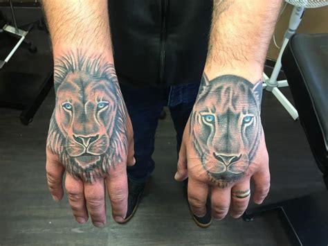 Lion & Lioness Hand Tattoos | Hand tattoos, Tattoos, Lioness tattoo