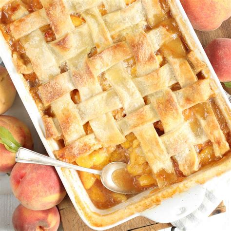 Peach Cobbler (Peach Cobbler with Pie Crust | A Farmgirl's Kitchen