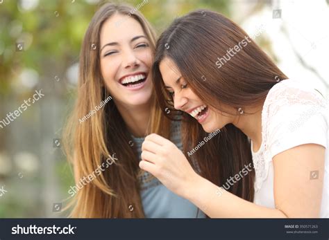 Two Happy Woman Friends Laughing Together Stock Photo 350571263 ...