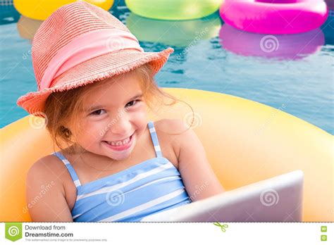 Girl Floating On Inflatable Raft In Swimming Pool Royalty-Free Stock Photo | CartoonDealer.com ...