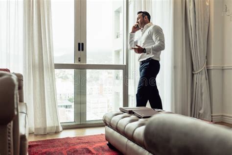 Businessman Making Phone Call from Hotel Room Stock Image - Image of copyspace, mobile: 126946033