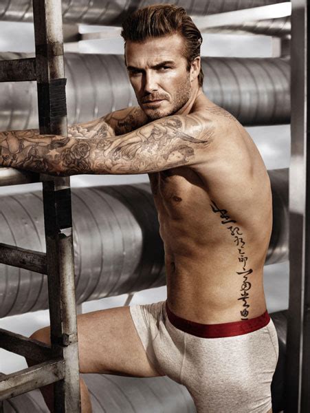 David Beckham shows off his rippling abs and toned torso for new H&M ...