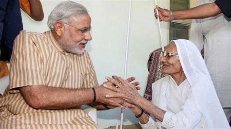 Heart-warming photos of PM Modi with his mother Hiraben | Zee Business