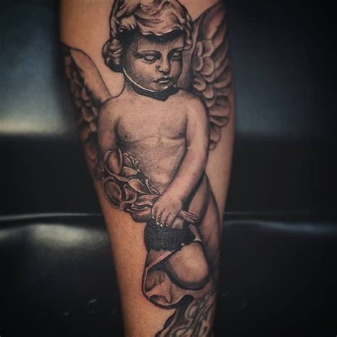 Tattoo Designs and Ideas - Tattoospedia | Baby angel tattoo, Cherub tattoo, Angel tattoo designs