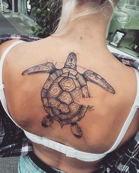 Download Tattoos Turtle Back On Blonde Woman Pictures | Wallpapers.com