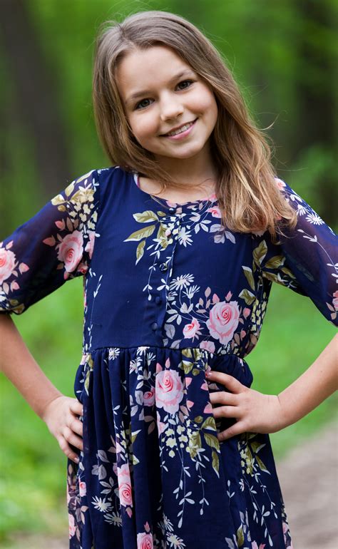 Photo of a cute 12-year-old girl photographed in May 2015, picture 9