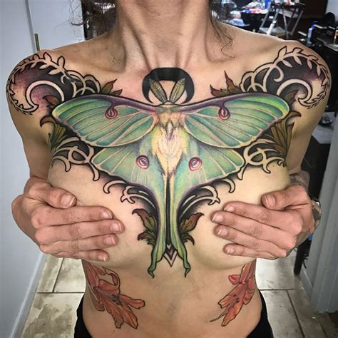 Luna Moth Tattoo Done on Girls Chest | Best tattoo design ideas