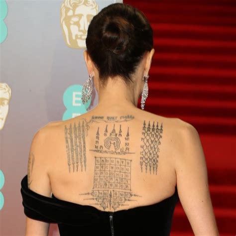 Angelina Jolie showing off her ‘protection’ tattoos done by a Thai monk ...