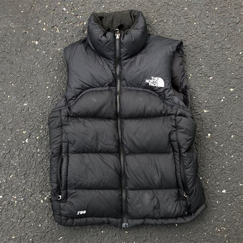 Women’s The North Face 700 Nuptse down puffer vest. Puffy style in a black and white color ...