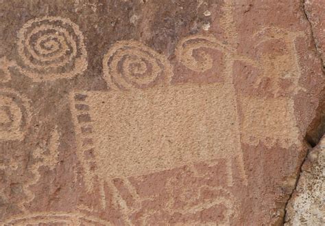 Stylized bighorn sheep and spirals petroglyphs. Fremont Indian State Park and Museum, Utah ...