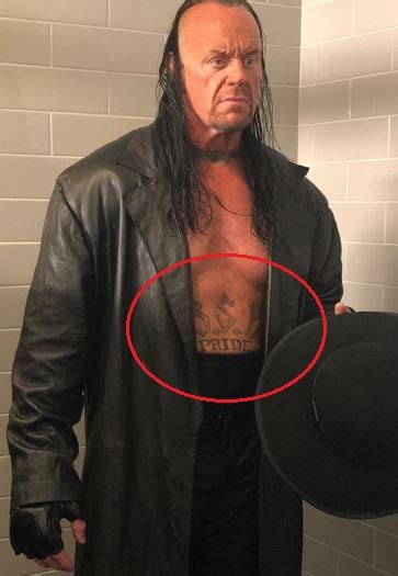 Undertaker's 4 Tattoos & Their Meanings - Body Art Guru