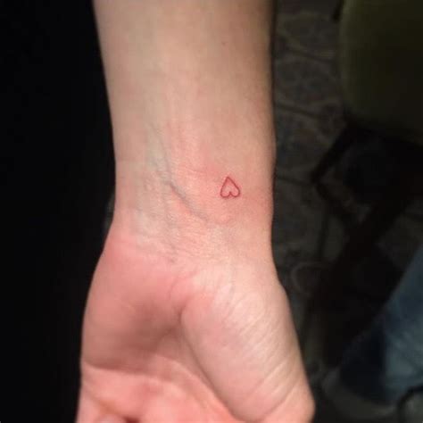 Tiny Red Heart Tattoo on Wrist