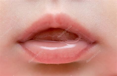 Close up of lips of baby girl — Stock Photo © freefly #6232223