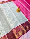 Yellow color tissue silk saree with woven design