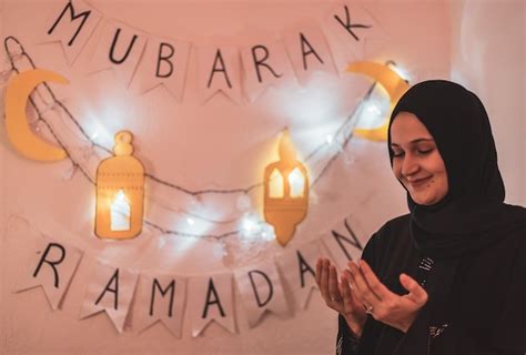 Premium Photo | Image of muslim woman praying with hands up with ...